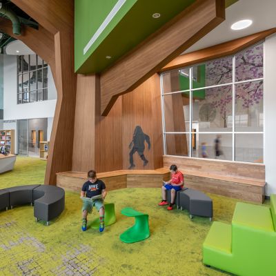 Interface carpet tile in K-12 library set as a forest scene